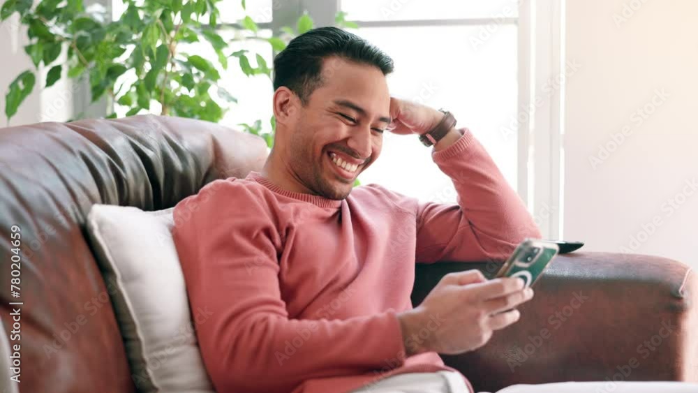 Aufkleber phone, laughing and man on sofa at his home networking on social media, mobile app or internet. happ