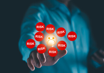 Extreme risk taking, stress and frustration. Too many risk factors. Risky business environment. Unhappy face surrounded with the word risk.