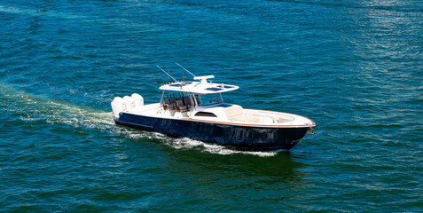 Motor private yacht in sea. Yacht in navigation. Private boat off the beach. Summer vacation....