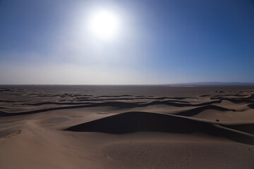 A panoramic sand dune of sahara desert at Mhamid el Ghizlane in Morocco wide shot