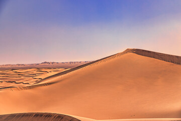 A sand dune of sahara desert at Mhamid el Ghizlane in Morocco telephoto shot