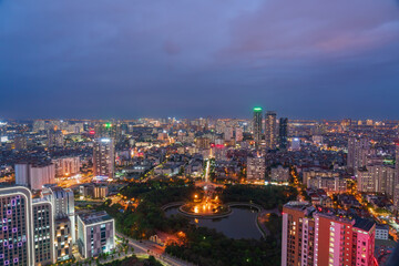 Fototapeta na wymiar Aerial skyline view of Hanoi cityscape at twilight in Cau Giay district, Hanoi