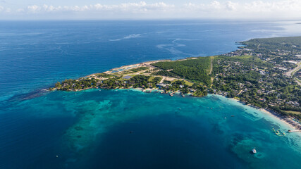 aerial landscape view of Discovery Bay, Jamaica with Fortlands Point on the Beach - obrazy, fototapety, plakaty