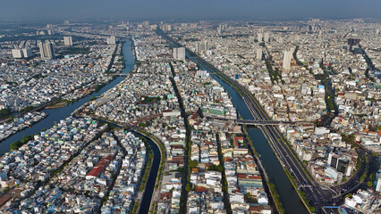 Impression Ho chi Minh cityscape aerial with canal system, overcrowded riverside urban, Vo Van Kiet...