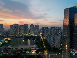 Aerial skyline view of Hanoi cityscape at sunset in Le Van Luong street