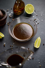 teriyaki say sauce and olive oil marinade in a glass bowl