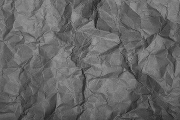 Wrinkled gray paper. Background, texture of crumpled paper.