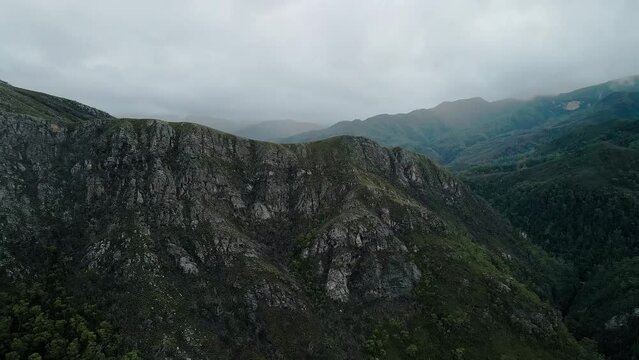 Rugged Mountains With Overcast Sky Over Tasmania's Franklin Gordon Wild Rivers National Park In Southwest, Australia. Aerial Shot
