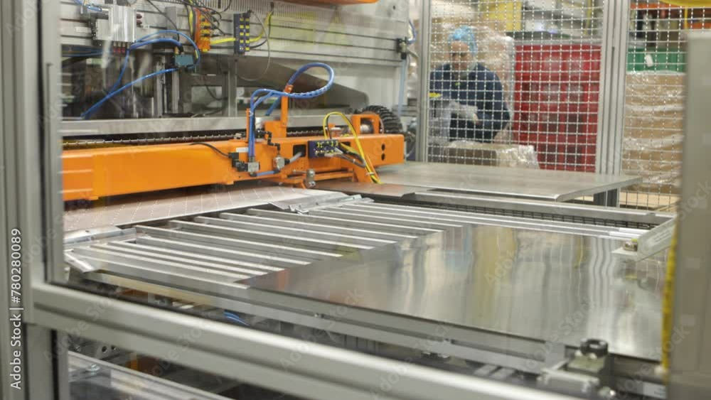 Poster established of automatic power press with workers working at the end of automatic line