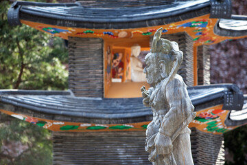 View of the sculpture against the pagoda