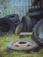 Discarded wheels and tyres on a farm