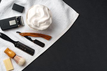 Traditional Wet Shaving Gear Arranged on a Dark Background With Morning Light