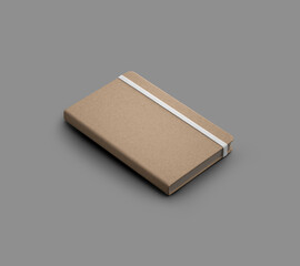 Mockup of closed craft notebook with white band, isolated with shadows on gray background, diagonal presentation.