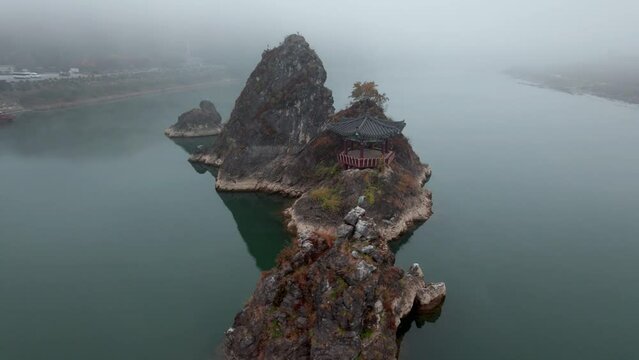 Dodamsambong Peaks Danyang Korea Drone Footage of peaks in river with pagoda and f og