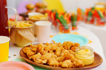 A plate of nuggets and sauce. A delicious and simple appetizer for a holiday or lunch.