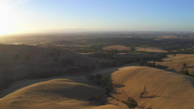 Aerial drone view at sunset of Steingarten lookout in South Australia.
Steingarten lookout, located in the Barossa Valley,  is the perfect spot for a picnic and a well-deserved glass of wine at sunset