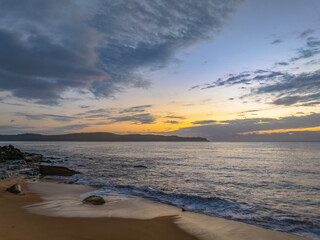 Fototapeta premium After the rain sunrise at the seaside