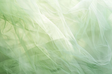 Fototapeta premium Close up of green tulle fabric texture background with copy space.