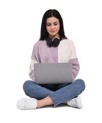 Student with laptop sitting on white background