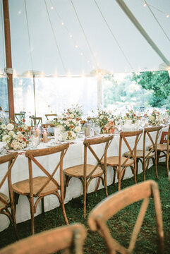Elegant outdoor wedding reception under a tent