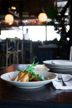 Seafood dish on a table in a restaurant atmosphere