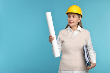 Architect in hard hat with draft and folder on light blue background, space for text