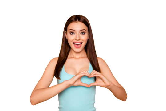 Studio photo portrait of pretty cute tender gentle nice beautiful attractive charming she her girl make give heart on chest isolated bright vivid background