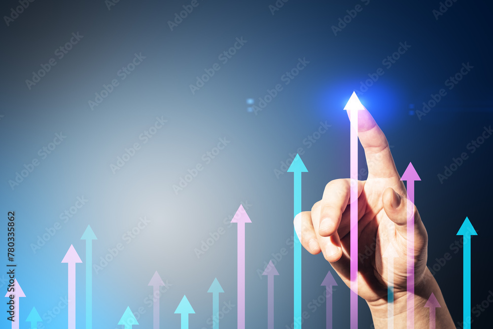 Poster close up of male hand pointing at various growing arrows on gray background with mock up place. grow