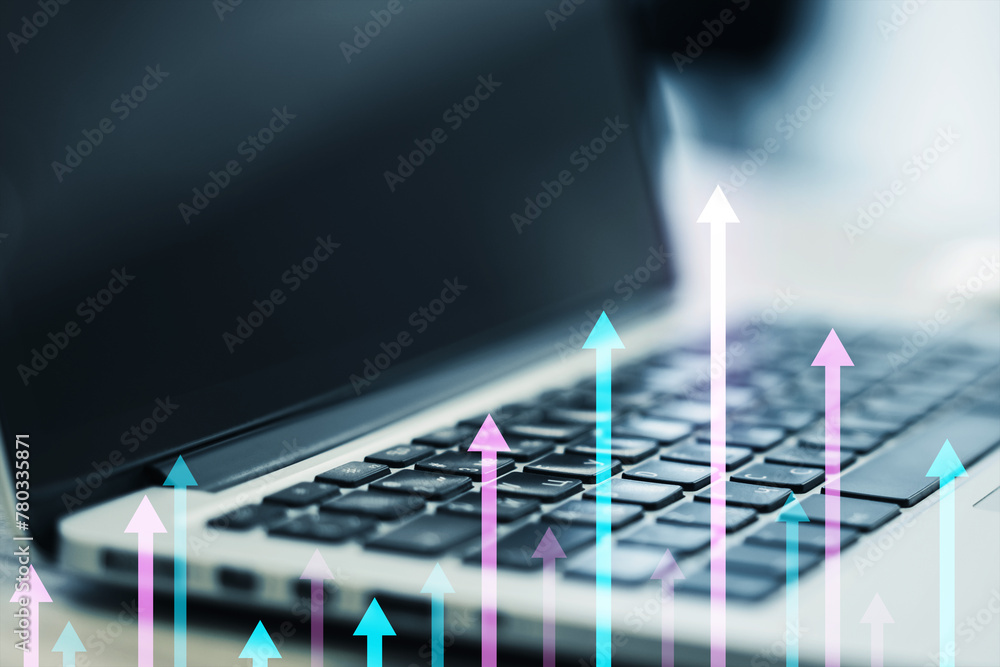 Poster Close up of laptop on desk with various growing arrows on blurry background. Mock up screen. Growth, future and performance concept.