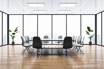 Modern light meeting room interior with wooden flooring, furniture and panoramic window with city...