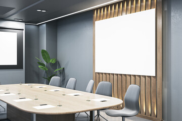 Modern wooden and concrete conference room interior with empty white mock up banner and furniture....