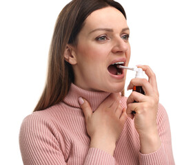 Naklejka premium Woman using throat spray on white background