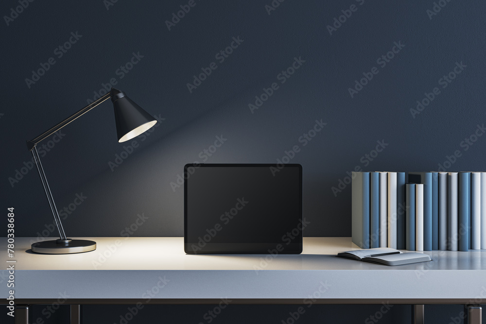 Poster modern concrete workplace with lamp, books and mock up tablet. workspace close up. 3d rendering.