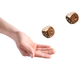 Man throwing golden dice on white background, closeup