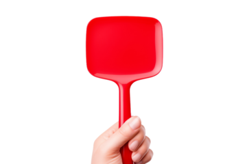 Hand Holding Red Spatula on White Background. On a White or Clear Surface PNG Transparent Background.