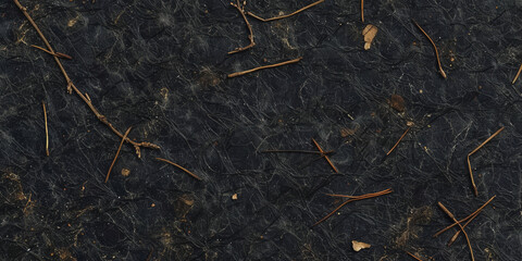 closeup texture of black paper with small twigs scattered across it,	
