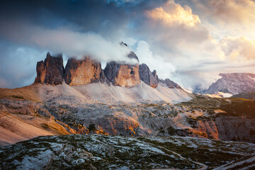 A mighty rocky massif Tre Cime di Lavaredo (Drei Zinnen). Italian Alps, Sexten Dolomites, South Tyrol, Europe.