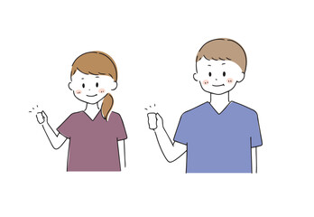 ガッツポーズをする医療従事者