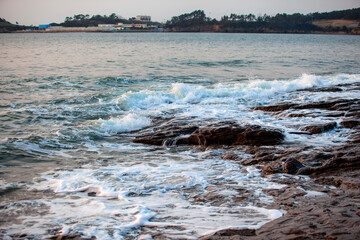 View of the rocks with the surf at the seaside