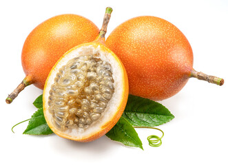 Granadilla and open granadilla with black seeds and gelatinous pulp isolated on white background.