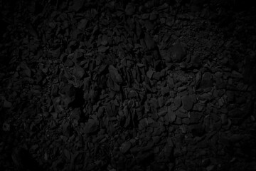 Black stone debris. Rock fragment background. - obrazy, fototapety, plakaty