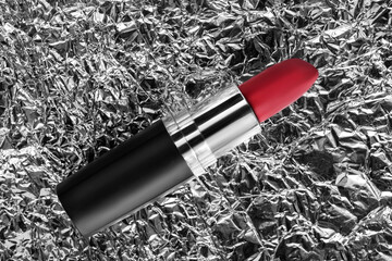 Red lipstick on foil