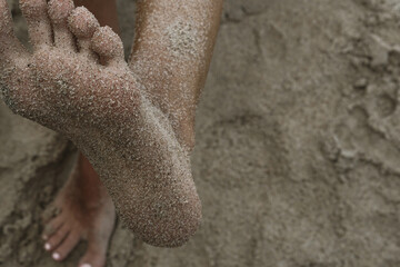 feet and sand
