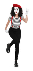 Funny mime with beret posing on white background