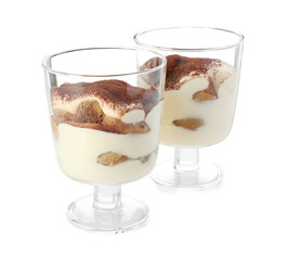 Delicious tiramisu in glasses isolated on white