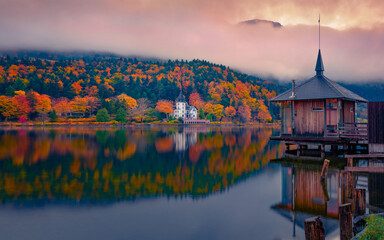 Calm autumn scene of Grundlsee lake. Perfect morning view of Brauhof village, Styria stare of Austria, Europe. Colorful sunrise on Austrian Alps. Traveling concept background. - 780384613