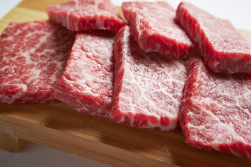 raw meat on a cutting board