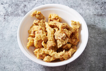 Fried meat in a bowl, sweet and sour pork