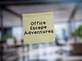 Post note on glass with 'Office Escape Adventures'.