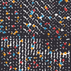 The dense surface consists of dark and colored dots.